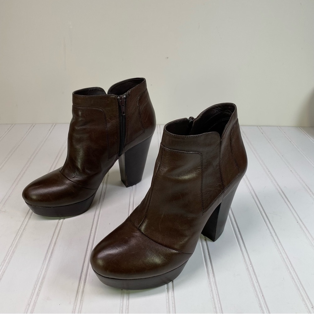Gianni Bini brown leather brown leather platform ankle booties.